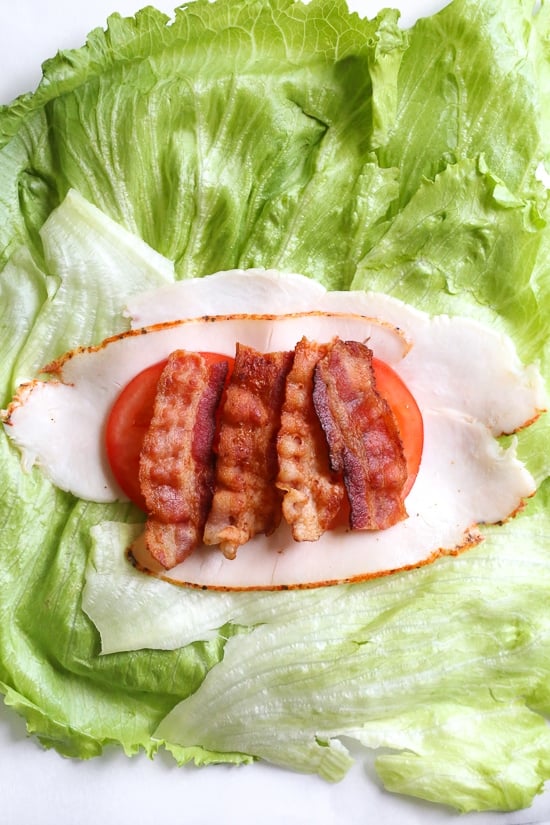 Chicken Club Lettuce Wrap Sandwich, a low-carb (keto) lunch idea that replaces a wheat wrap for a lettuce wrap. Just 5 ingredients, and less than 10 minutes to make!