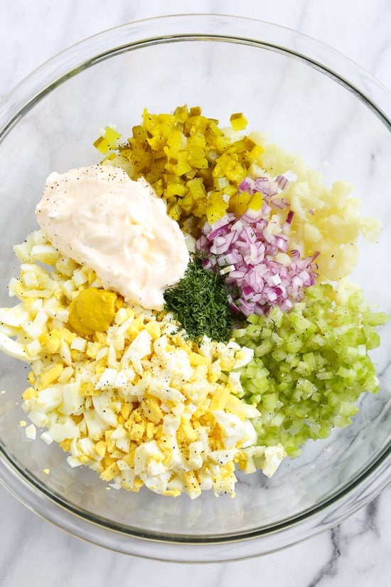 A low-carb faux "potato" salad made with cauliflower instead of potatoes, perfect for Keto or if you're just looking to eat less carbs.