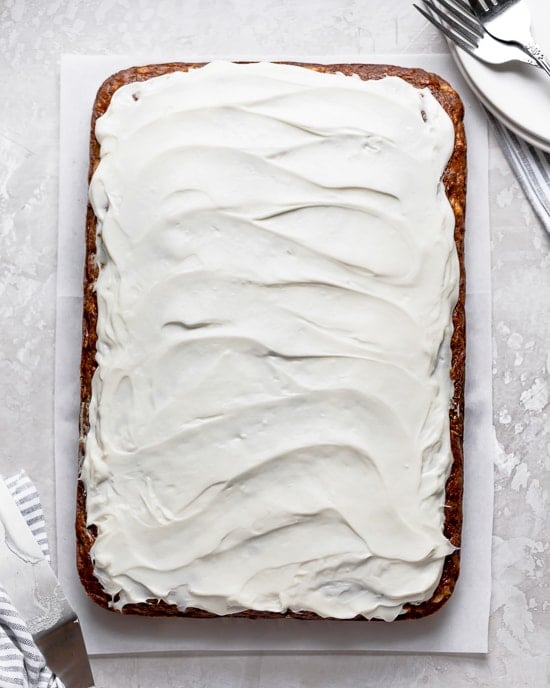 Fruity, moist and delicious, this banana and zucchini cake is loaded crushed pineapple and lightly sweetened with honey.