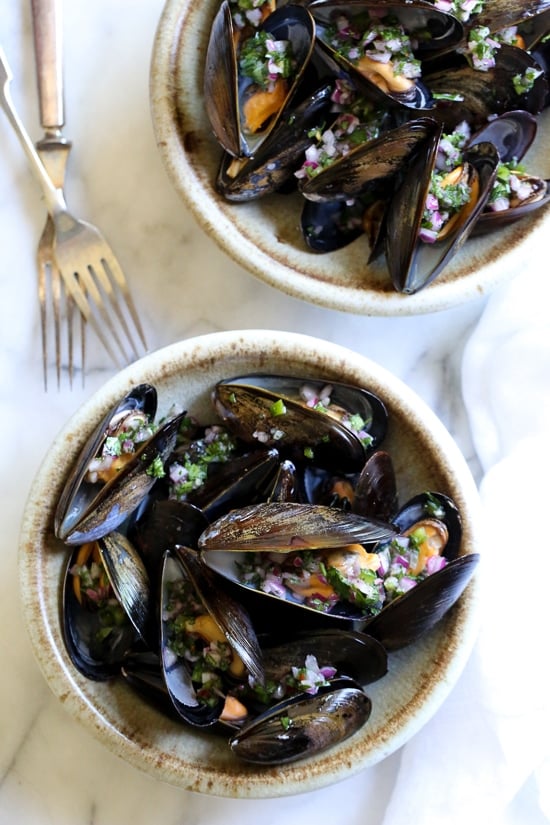 Steamed mussels get a kick with spicy Piri Piri Sauce which is basically a kicked up chimichurri sauce.