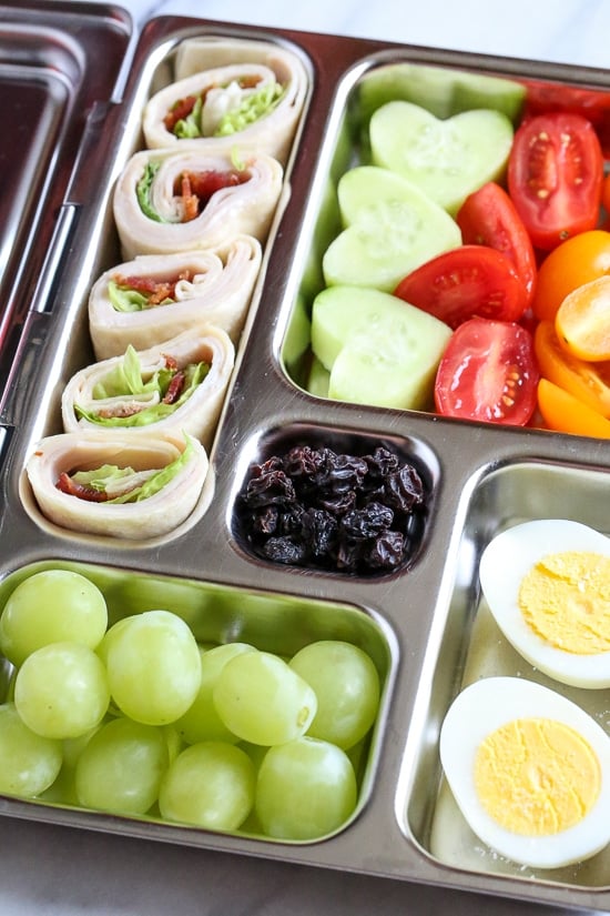 Your kids will love these Turkey Club Rollups packed in their bento style lunchbox!