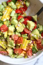 This Corn Tomato Avocado Salad is summer in a bowl! The perfect side dish with anything you're grilling, or double the portion as a main dish.