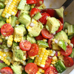 This Corn Tomato Avocado Salad is summer in a bowl! The perfect side dish with anything you're grilling, or double the portion as a main dish.