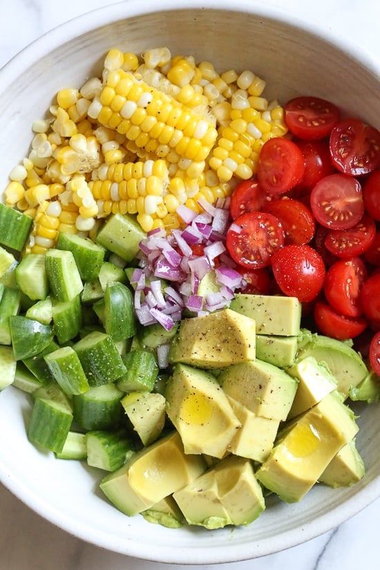 corn, tomatoes, cucumbers and avocado.
