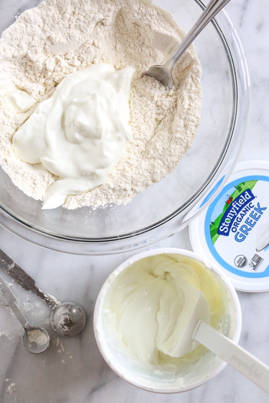 This easy Grilled Pizza is made from scratch with my easy yeast-free Greek yogurt dough, topped with sauce, mozzarella cheese and your choice of toppings. A great summer outdoor meal that whole family can enjoy!