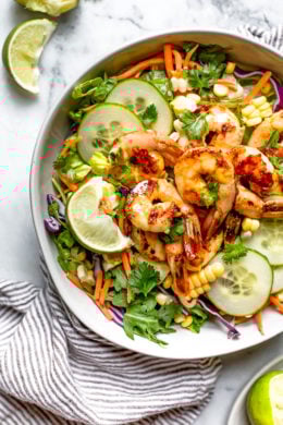 This refreshing Thai-style salad with greens, herbs, veggies and shrimp, all tossed in a delicious cashew dressing, is the perfect one-dish summer dinner.