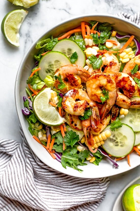 This refreshing Thai-style salad with greens, herbs, veggies and shrimp, all tossed in a delicious cashew dressing, is the perfect one-dish summer dinner.