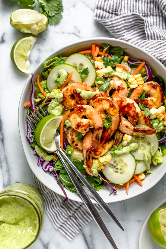 This refreshing Thai-style salad with greens, herbs, veggies and shrimp, all tossed in a delicious cashew dressing, is the perfect one-dish summer dinner.