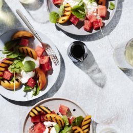 Although burrata—a fresh cheese made with mozzarella and cream—is undeniably the star of this light summer salad, the juicy grilled peaches and refreshing watermelon are pretty hard to resist.