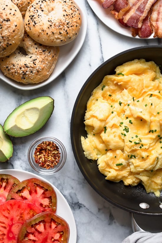 Bacon, egg and avocado on a bagel is my favorite breakfast sandwich made with scrambled eggs, center cut bacon and sliced tomatoes on my homemade bagels.