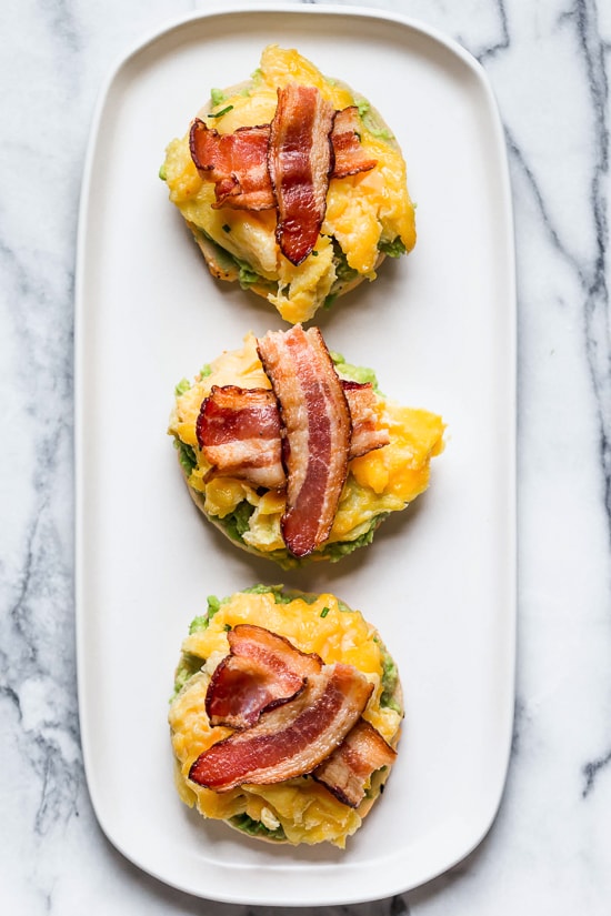 Bacon, egg and avocado on a bagel is my favorite breakfast sandwich made with scrambled eggs, center cut bacon and sliced tomatoes on my homemade bagels.