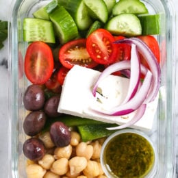 Greek Chickpea Salad, made with chickpeas, cucumbers, tomatoes, bell peppers, olives and Feta is perfect to make ahead, for lunch for the week!