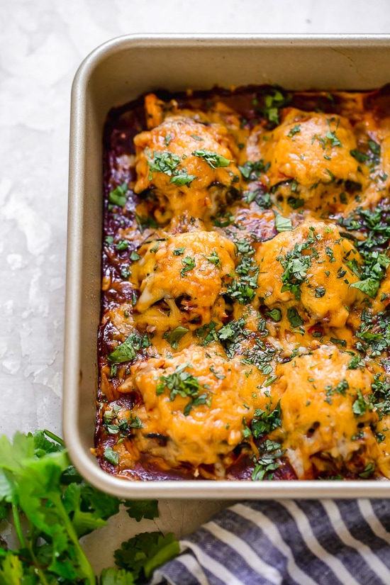 These Zucchini Chicken Enchilada Roll Ups are filled seasoned shredded chicken, topped with enchilada sauce and cheese. Delicious, and perfect for Keto, gluten-free or low-carb diets.