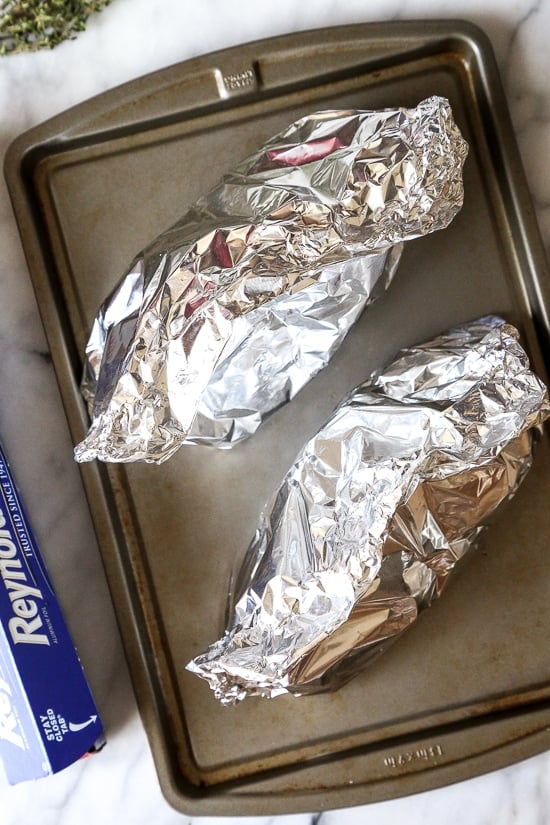 An easy Fall foil packet dinner made with spicy chicken Andouille sausage, Brussels sprouts and butternut squash. It's the perfect balance of spicy, smokey and sweet in every bite!