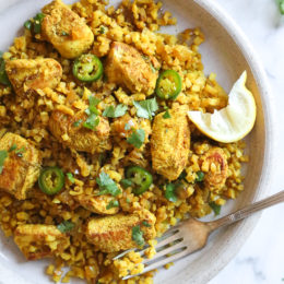 This quick and easy Indian-inspired skillet dish, is a low-carb take on Chicken Biryani, made with riced cauliflower in place of rice. It's also Keto, gluten-free and Whole30 compliant.