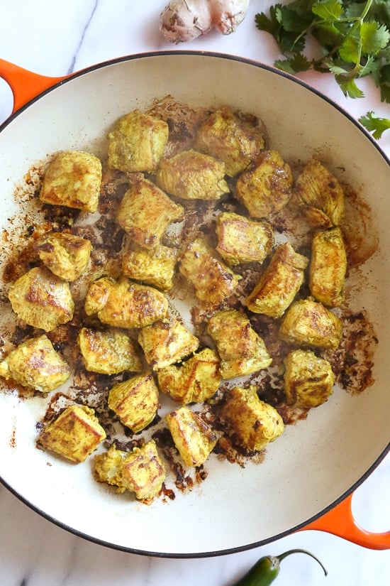 This quick and easy Indian-inspired skillet dish, is a low-carb take on Chicken Biryani, made with riced cauliflower in place of rice. It's also Keto, gluten-free and Whole30 compliant.