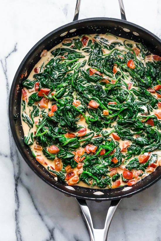 This easy Fish Florentine recipe, made with a pan seared firm white fish served on a creamy bed of spinach feels like something you would order out in a fancy restaurant!