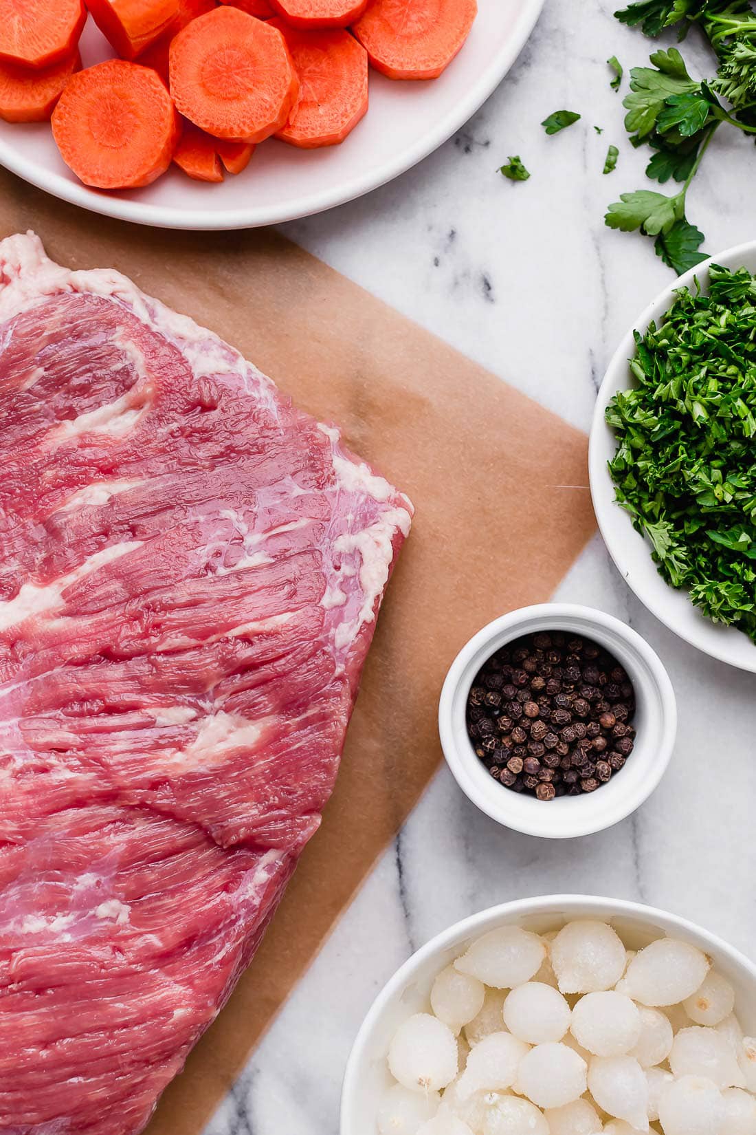 This easy Instant Pot Corned Beef and Cabbage recipe comes out perfectly tender every time! The perfect St. Patrick's Day dinner. Corned beef and cabbage ingredients