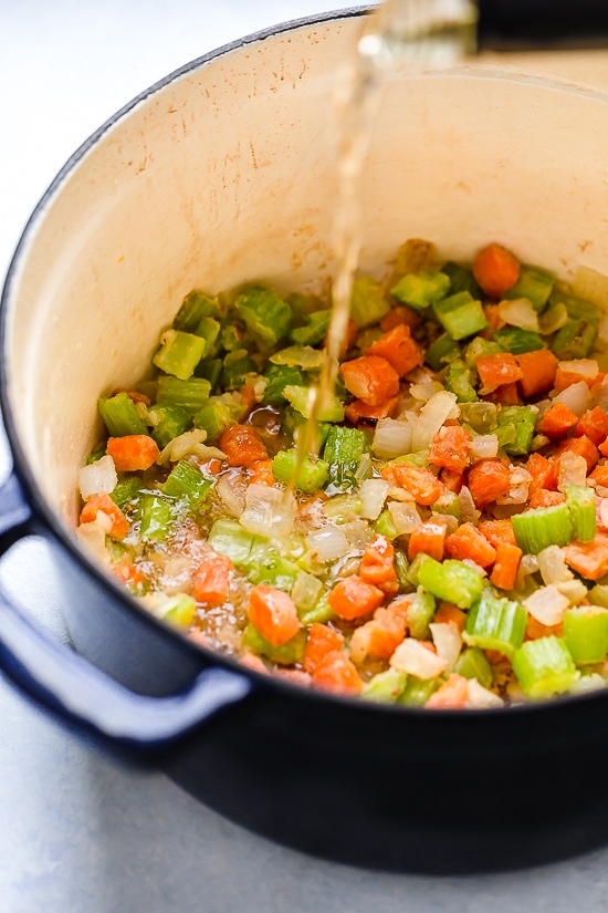 This creamy Smoked Salmon Chowder is truly comfort food in a bowl! Made with hot-smoked salmon (full of heart-healthy fats) and a ton of nutrient-packed veggies (onion, celery, carrots, potatoes, corn and cauliflower), it’s a good-for-you soup the whole family will love. Stove top and Instant Pot directions provided.