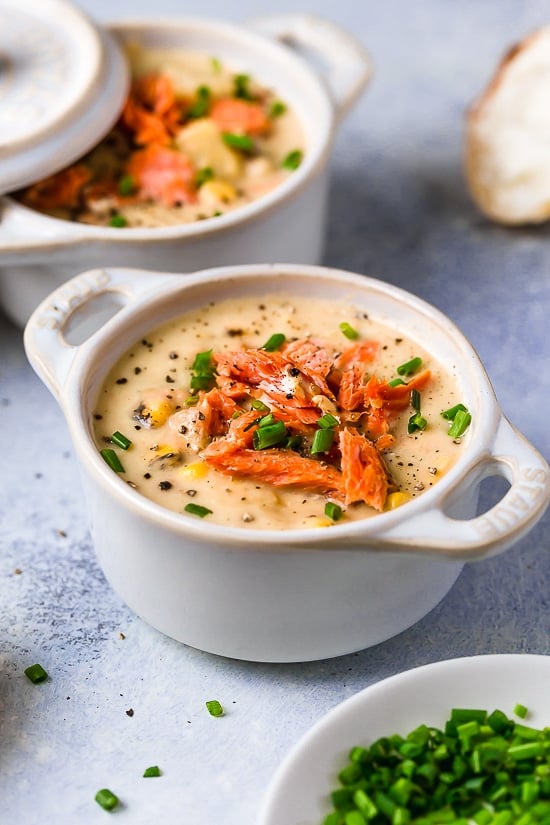 This creamy Smoked Salmon Chowder is truly comfort food in a bowl! Made with hot-smoked salmon (full of heart-healthy fats) and a ton of nutrient-packed veggies (onion, celery, carrots, potatoes, corn and cauliflower), it’s a good-for-you soup the whole family will love. Stove top and Instant Pot directions provided.