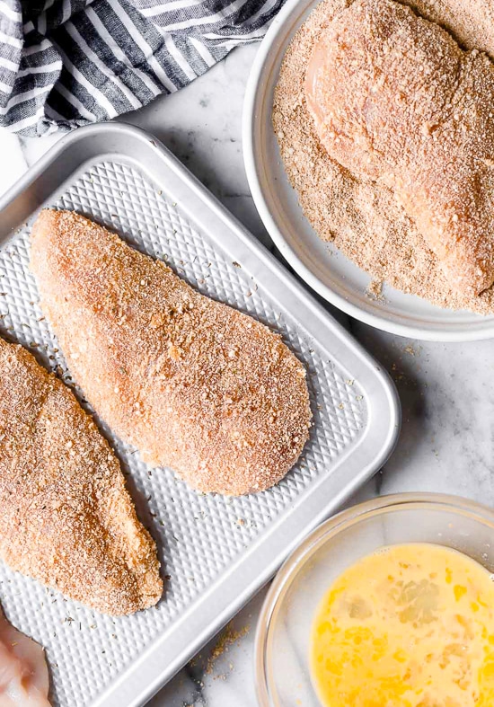 Chicken breasts dipped in breadcrumbs