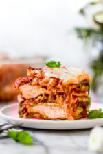 I combined two of my favorite foods – Chicken Parmesan and Lasagna to make this delicious Chicken Parmesan Lasagna, the perfect family-friendly dish to feed a large crowd!