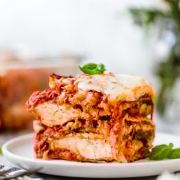 I combined two of my favorite foods – Chicken Parmesan and Lasagna to make this delicious Chicken Parmesan Lasagna, the perfect family-friendly dish to feed a large crowd!