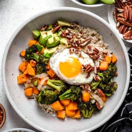 Overhead view of Buddha bowl with fried egg