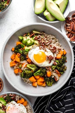 Overhead view of Buddha bowl with fried egg