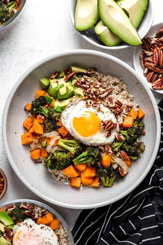 Overhead view of Buddha bowl with fried egg