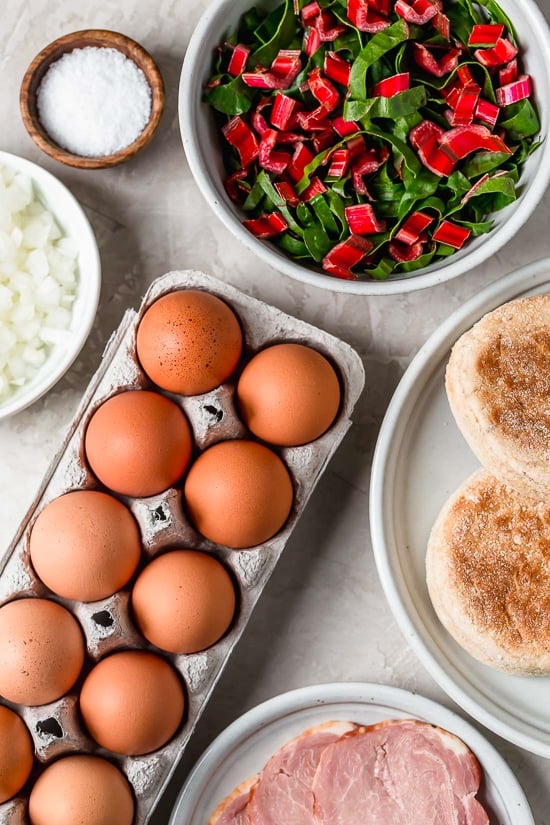 I love this lighter take on Eggs Benedict made with Canadian bacon, Swiss chard and poached eggs on a whole wheat English muffin. Perfect for breakfast or brunch!