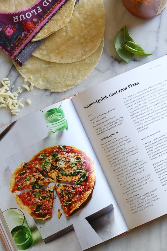 I'm obsessed with this Super-Quick Cast-Iron Pizza technique made with tortillas.This combined stove top and oven recipe comes out just like Domino's or any bar thin crust pizza!