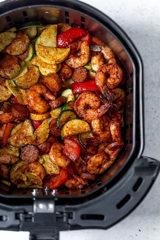 This fast and easy Air Fryer Cajun Shrimp recipe is a meal-in-one, made with shrimp, sausage, and lots of colorful vegetables such as zucchini, yellow squash and bell peppers. This fast and easy Air Fryer Cajun Shrimp recipe is a meal-in-one, made with shrimp, sausage, and lots of colorful vegetables such as zucchini, yellow squash and bell peppers.