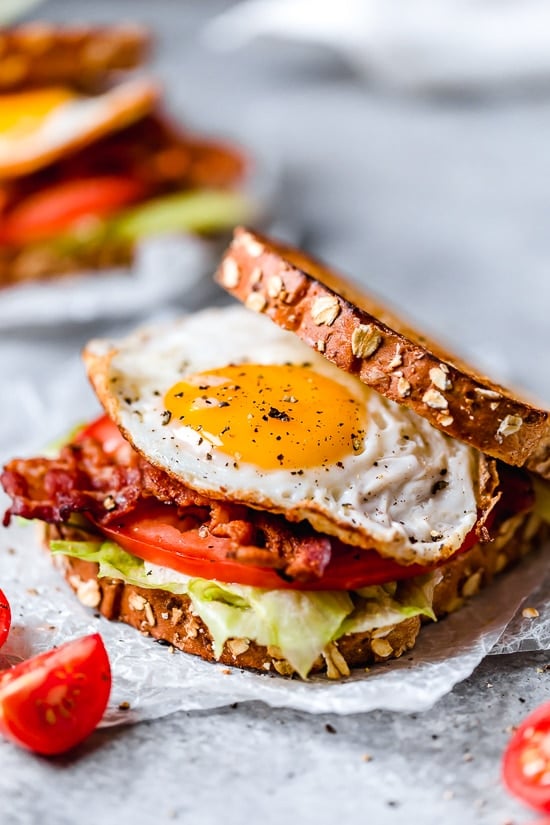 Breakfast BLT made with center cut bacon, lettuce, tomato and egg on whole wheat bread.