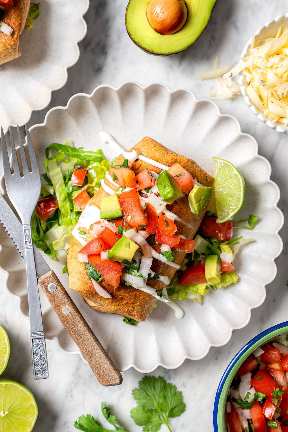Top-down view of chicken chimichanga on plate