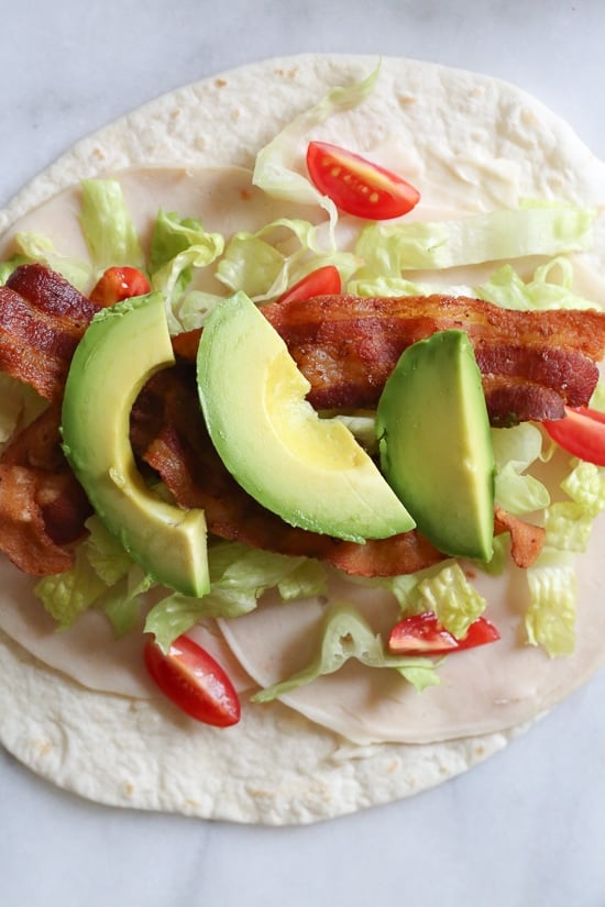 These easy BLT Roll Ups with Turkey and Avocado are delicious and perfect for school lunch.