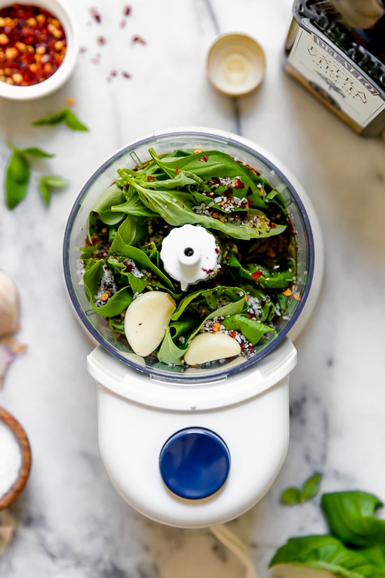Making basil oil is so simple and the end result is so amazing, trust me you’ll want to drizzle it all over your chicken, fish, tomatoes, vegetables or just eat it with some crusty bread!