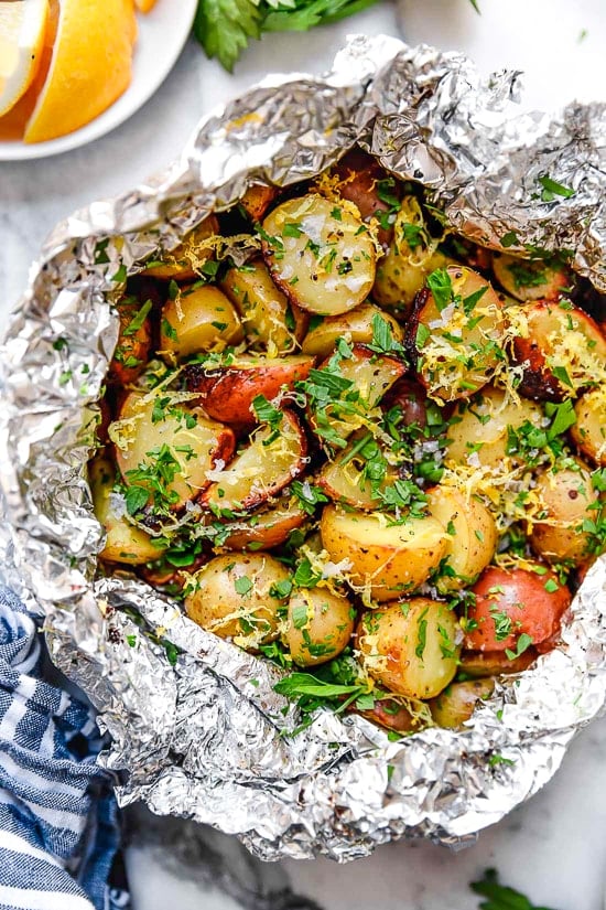 Lemon-Parsley Potato Foil Packets can be grilled or baked in the oven! A delicious side dish, and the best part – easy cleanup!