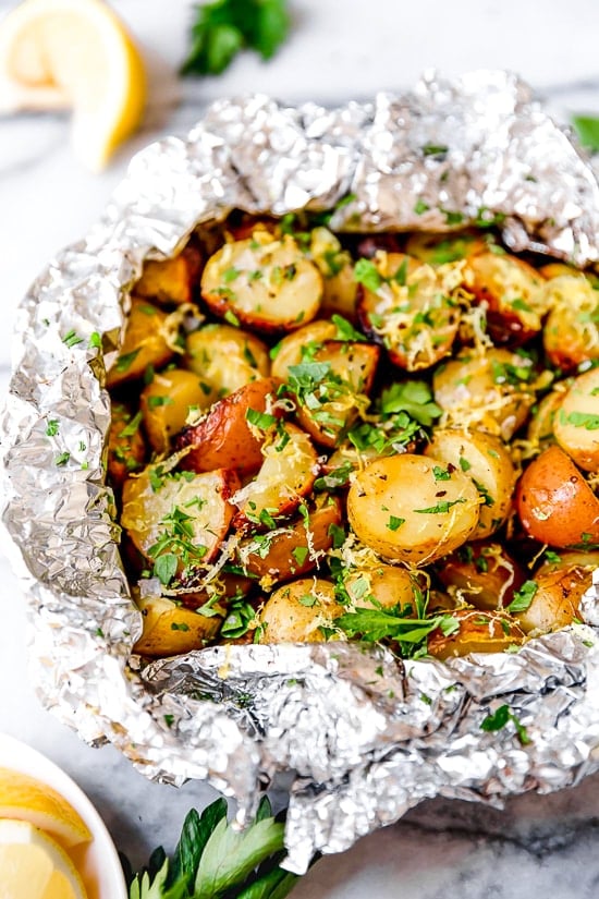 Lemon-Parsley Potato Foil Packets can be grilled or baked in the oven! A delicious side dish, and the best part – easy cleanup!