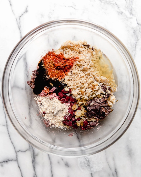 This is a veggie burger that even hearty meat-eaters will love! Made with beans, oats, brown rice, beets and a whole lot of spices, this veggie burger is a real crowd pleaser.