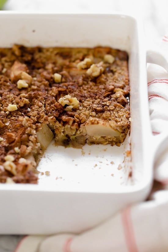 Baked oatmeal is like having dessert for breakfast! Made with healthy ingredients—bananas, pears, oats, nuts and maple syrup, it will leave you satisfied all morning.