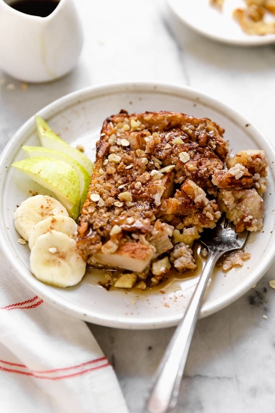 Baked oatmeal is like having dessert for breakfast! Made with healthy ingredients—bananas, pears, oats, nuts and maple syrup, it will leave you satisfied all morning.