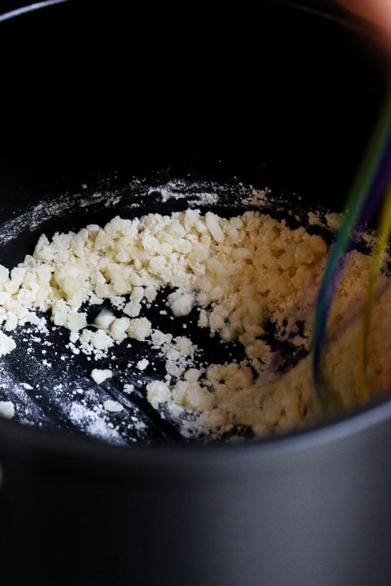 Making roux for cheese sauce.