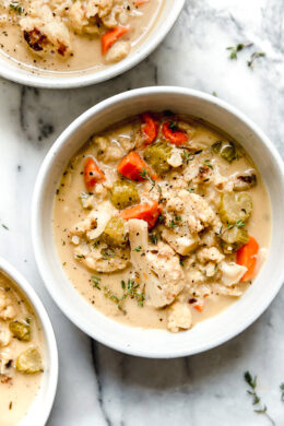 This Creamy Roasted Cauliflower Chowder is comfort food without all the calories. Made with roasted cauliflower, which adds deep, caramelized flavor while keeping the soup a little lighter.