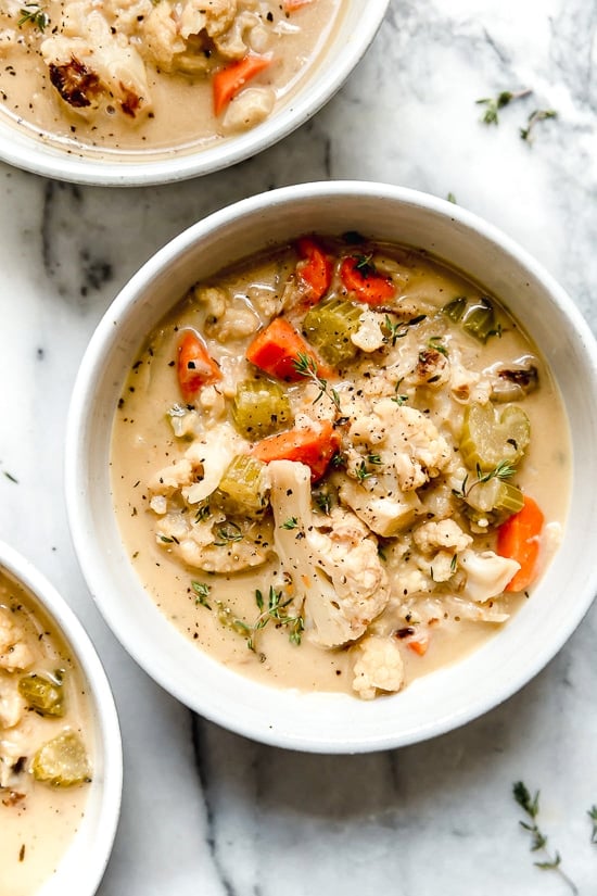 This Creamy Roasted Cauliflower Chowder is comfort food without all the calories. Made with roasted cauliflower, which adds deep, caramelized flavor while keeping the soup a little lighter.