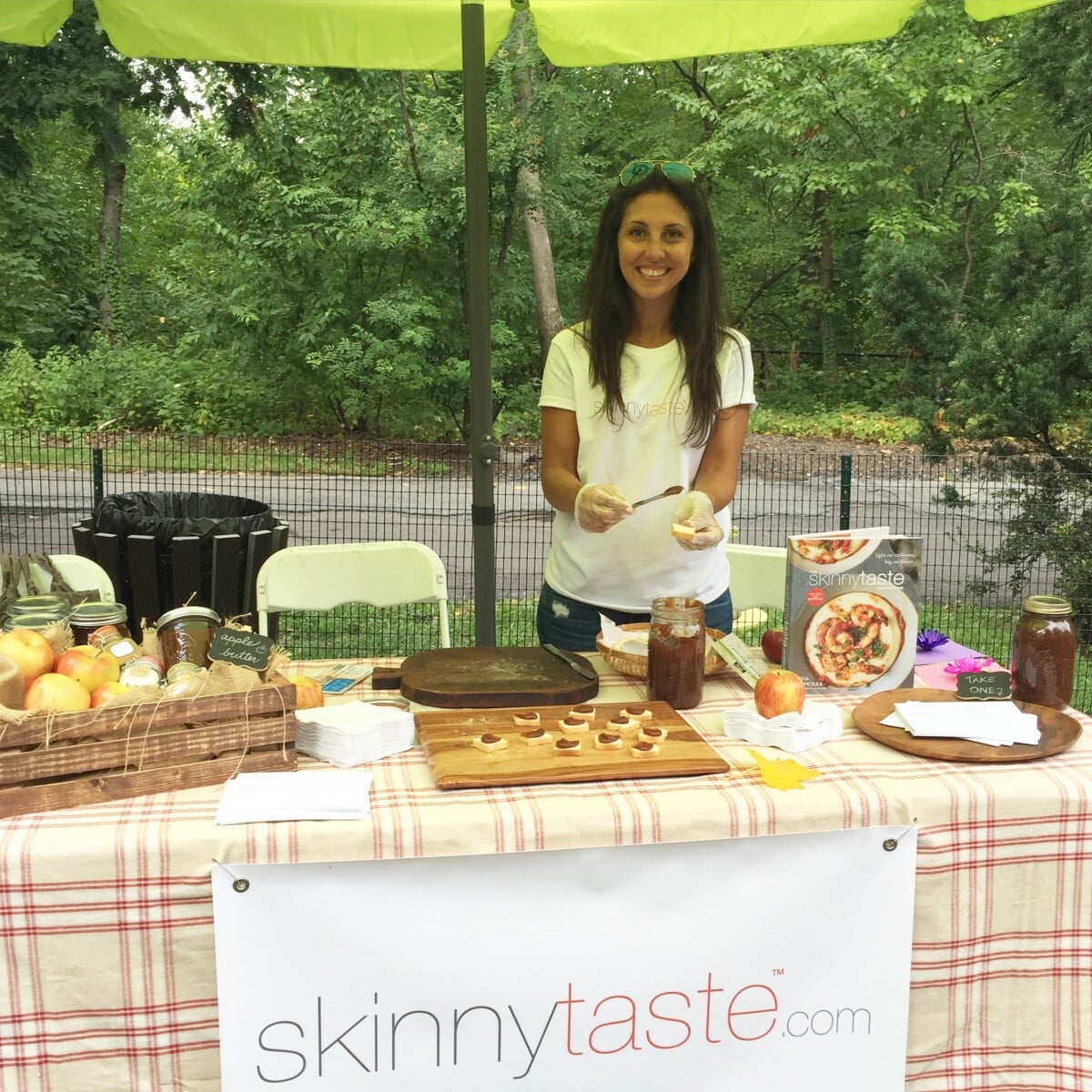 Me sampling pumpkin butter and apple butter at the Bronx zoo.