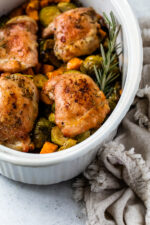 Baked Chicken Thighs with Brussels Sprouts and Sweet Potato, a quick and easy one-pot chicken dinner for a chilly, fall night.