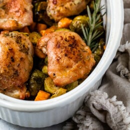 Baked Chicken Thighs with Brussels Sprouts and Sweet Potato, a quick and easy one-pot chicken dinner for a chilly, fall night.