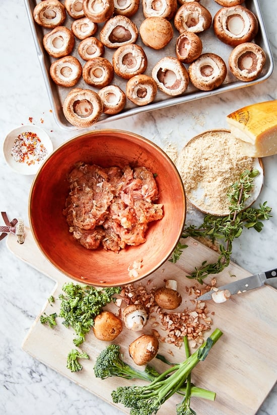 I'm OBSESSED with these Italian stuffed mushrooms filled with broccoli rabe and sausage, the perfect festive holiday appetizer!