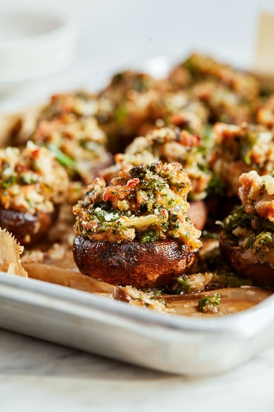 I'm OBSESSED with these Italian stuffed mushrooms filled with broccoli rabe and sausage, the perfect festive holiday appetizer!